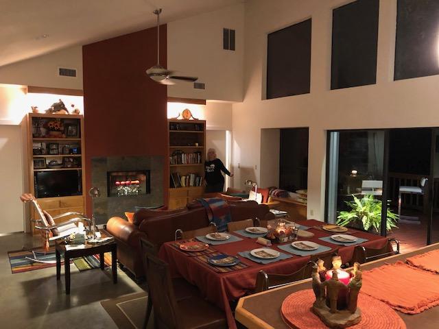 The grandroom has an all electrice galley kitchen, dining area, and conversation area. One is never out of the mix.  A large deck seen on the right overlooks the river.